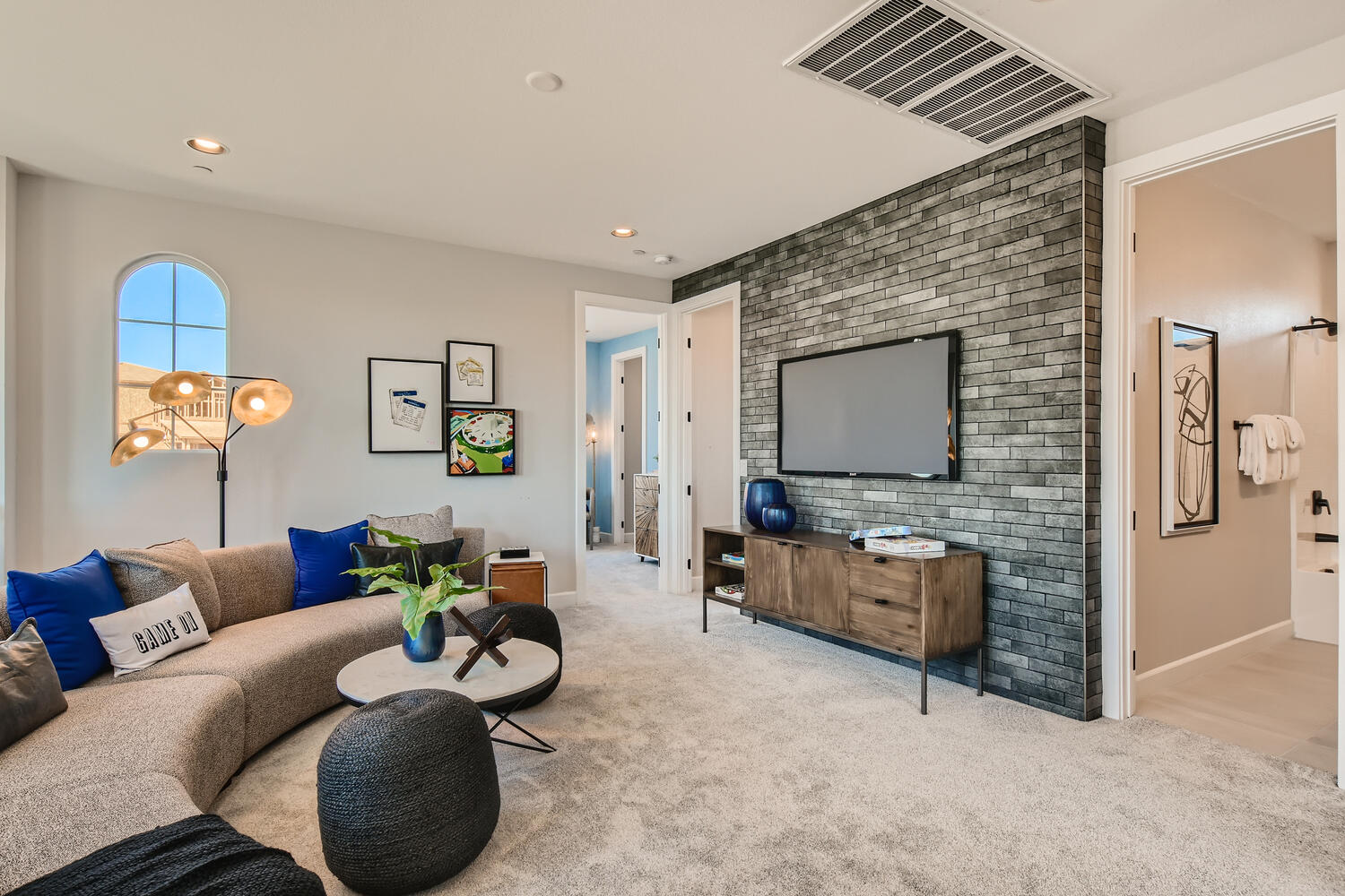 A living room with a fireplace.