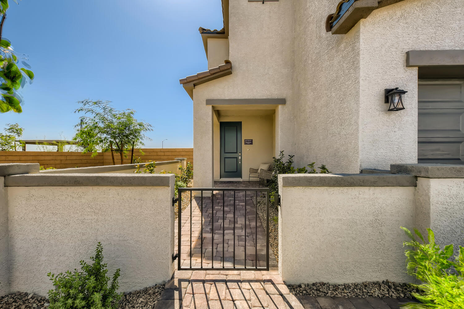 A gate in front of a building.