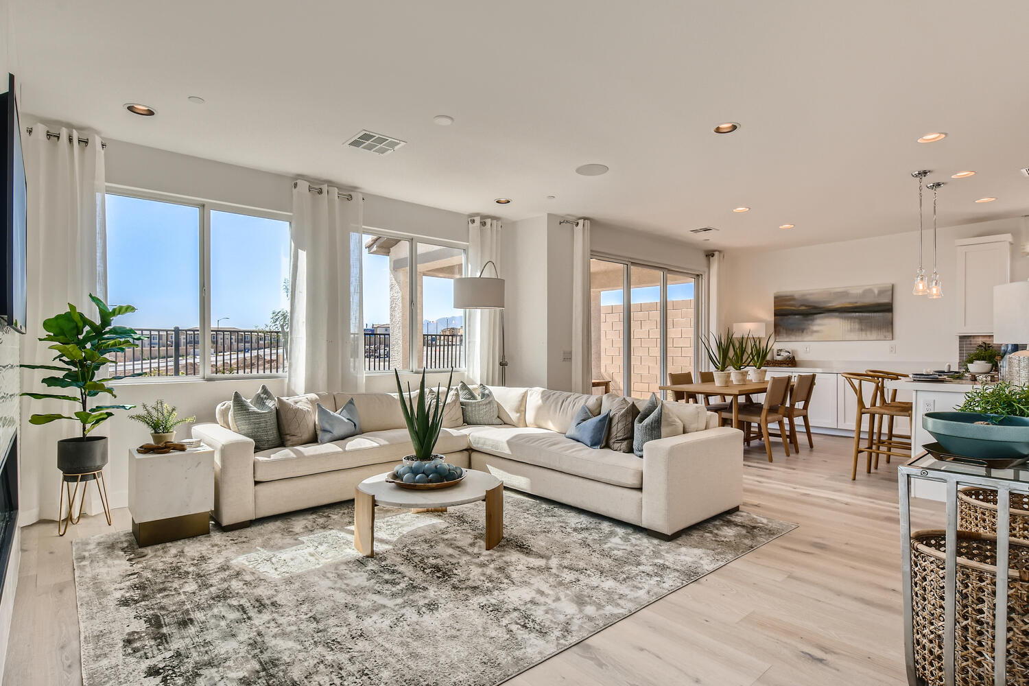 A living room with a large window.