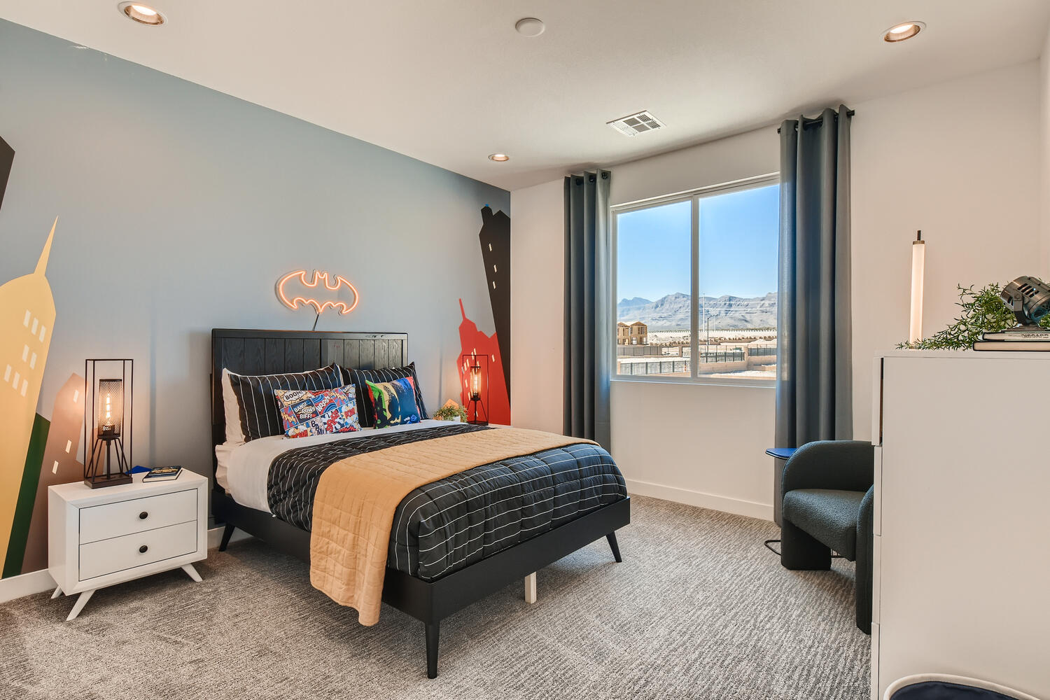 A bedroom with two beds.