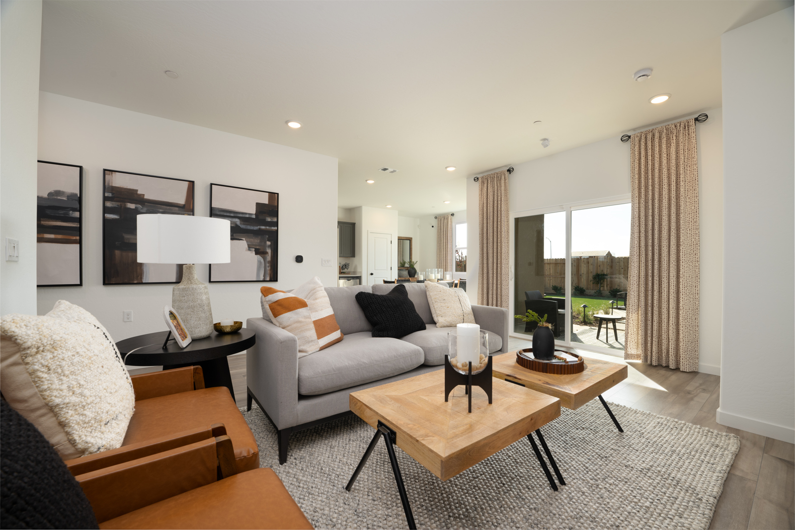 A living room with a large window.