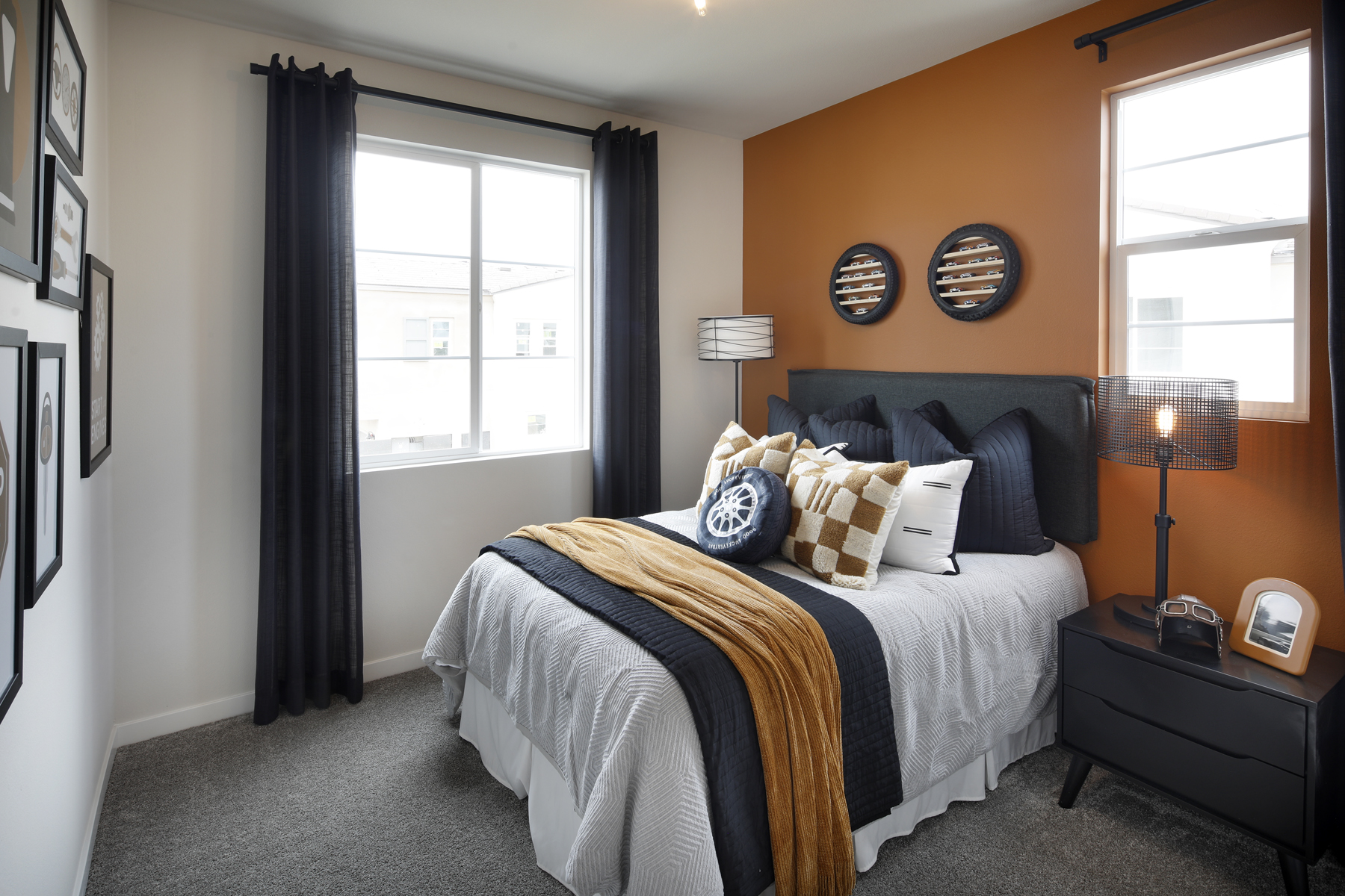 A bedroom with a bed and a window.