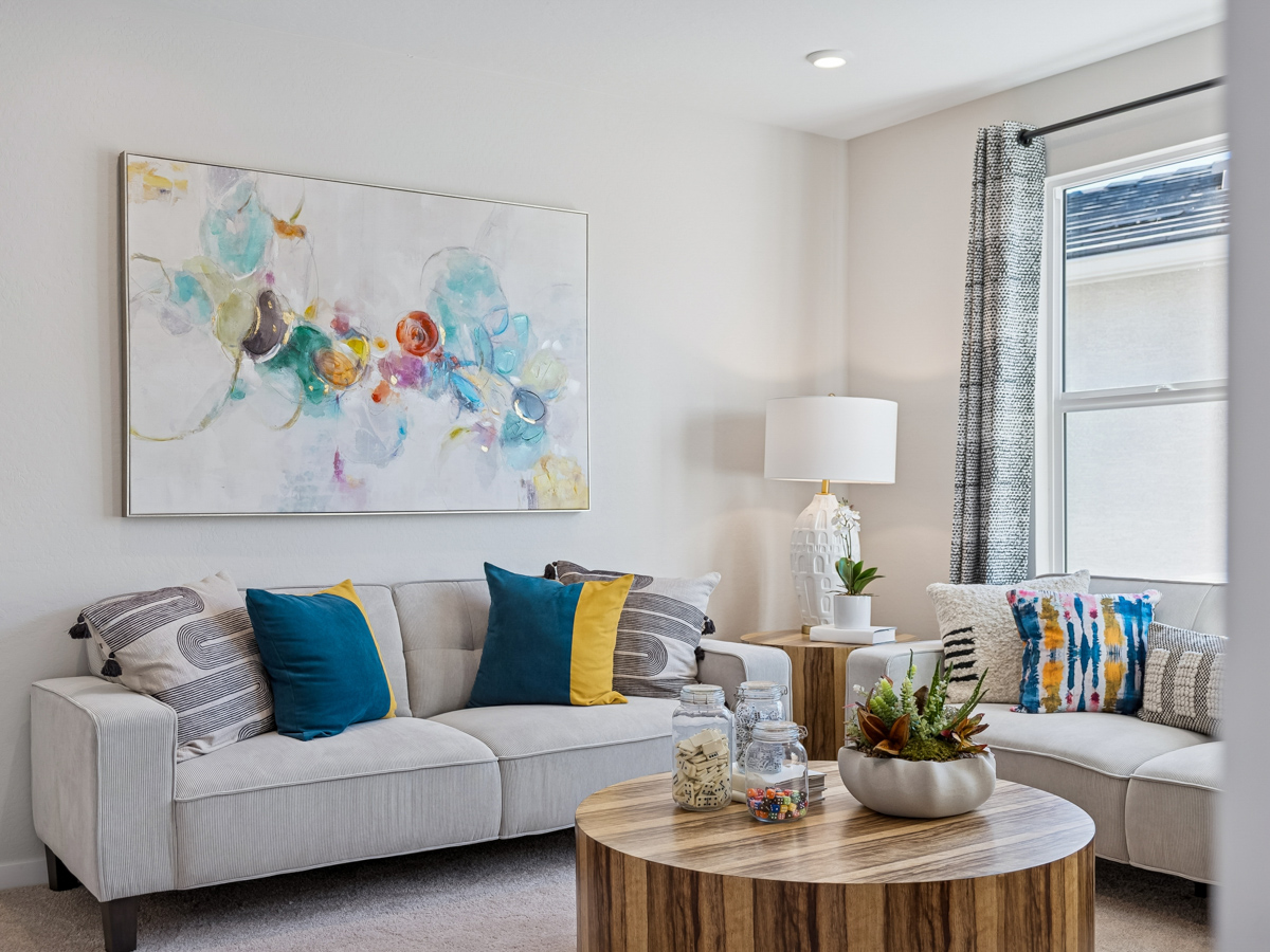 A living room with a couch and a coffee table.
