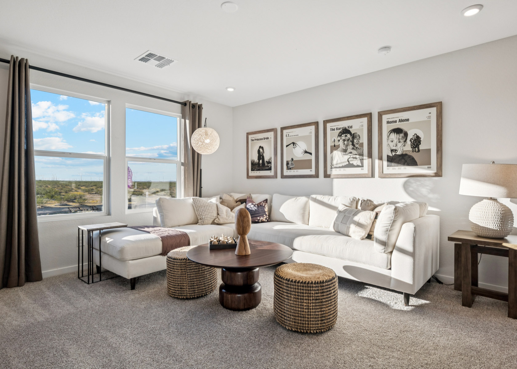 A living room with a large window.