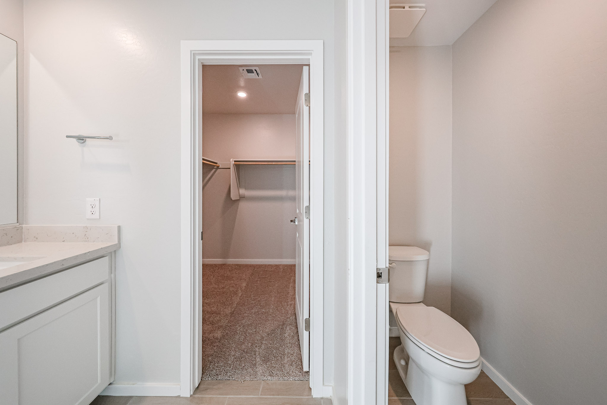 A bathroom with a glass shower.