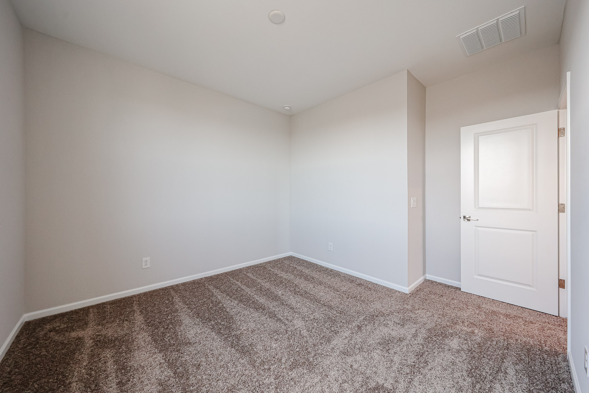 A room with white doors.