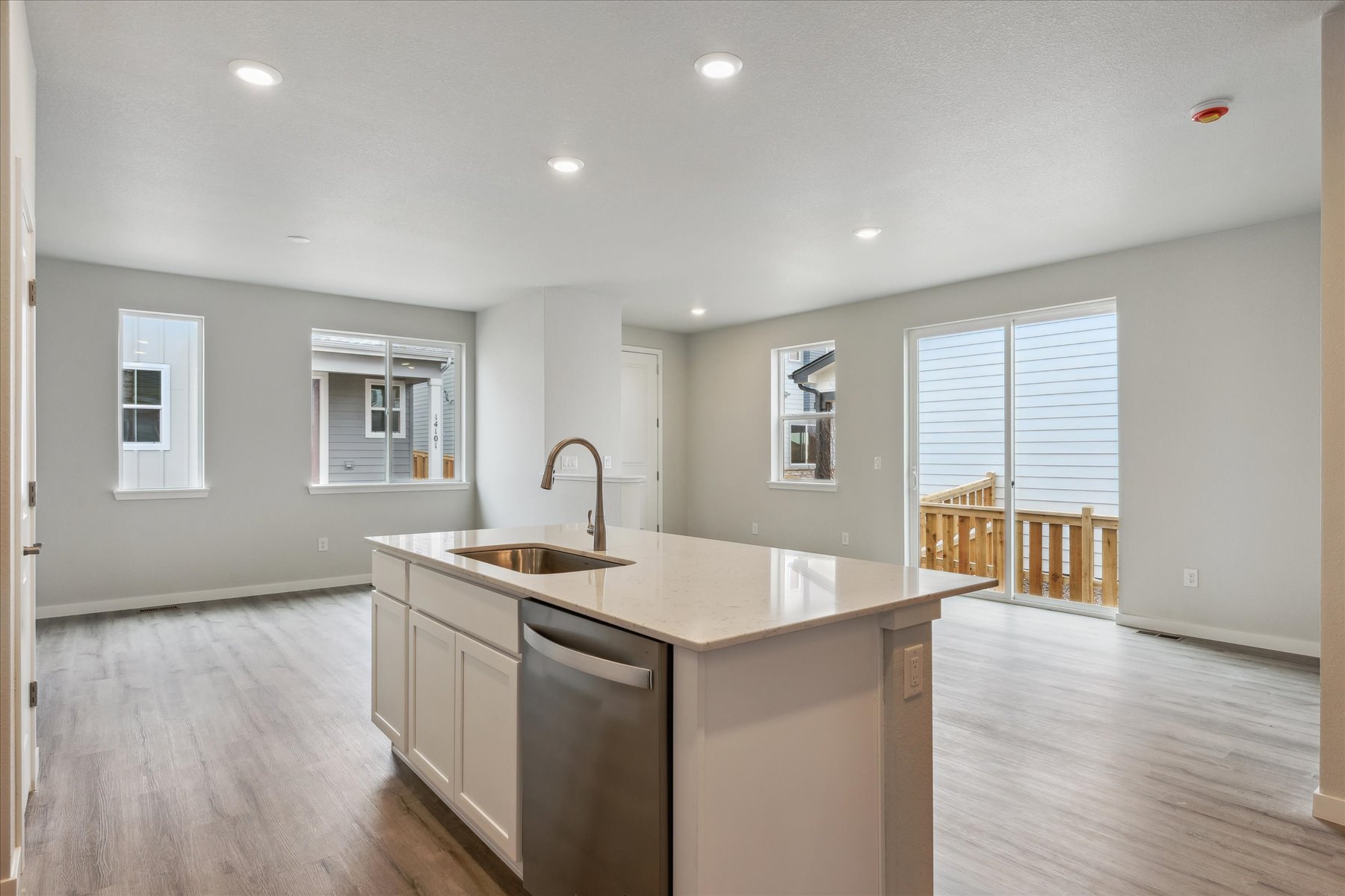A kitchen with a sink and cabinets.
