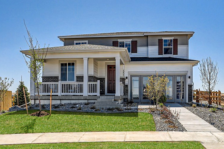A house with a large front yard.