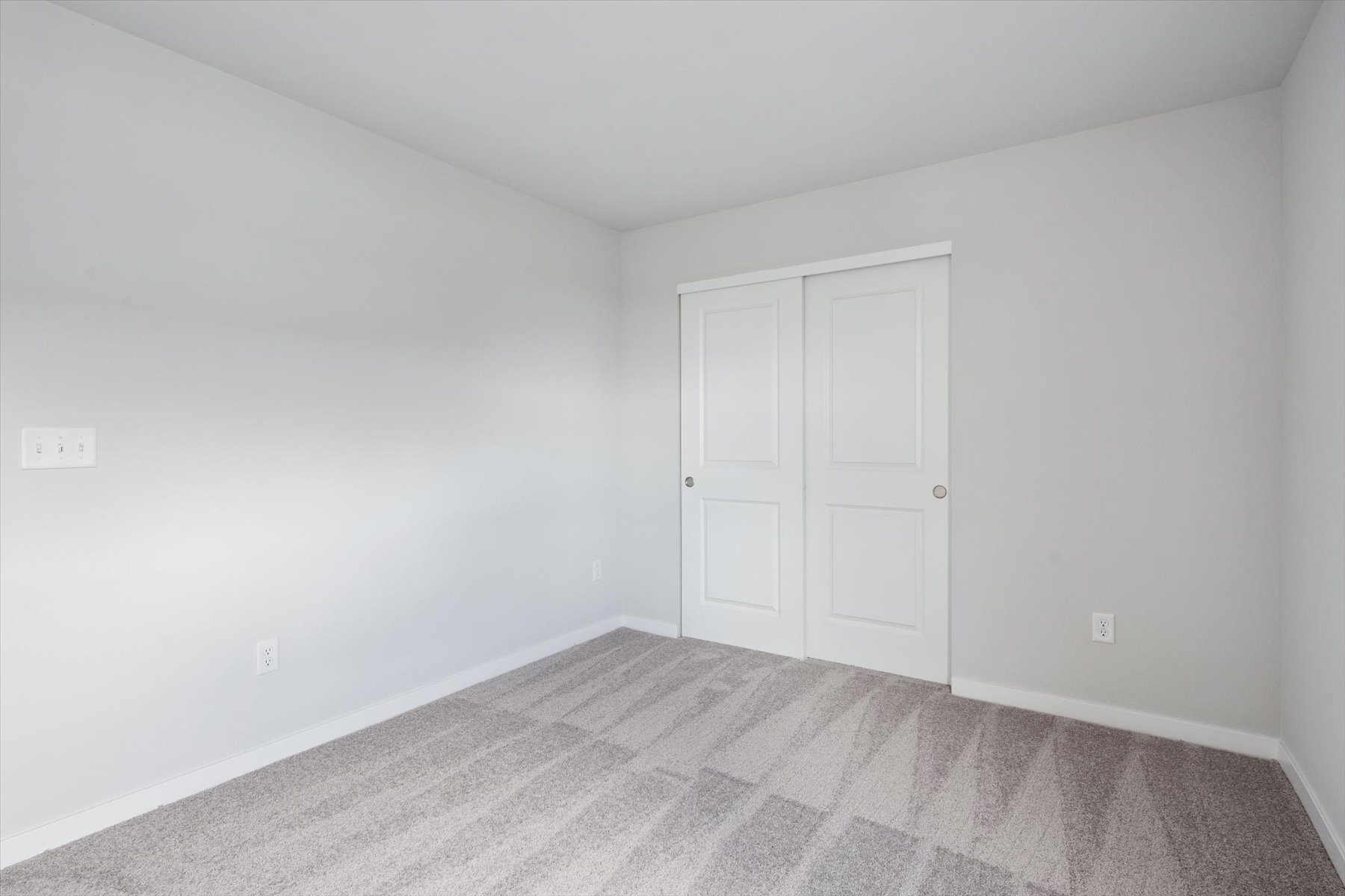 A room with white doors.
