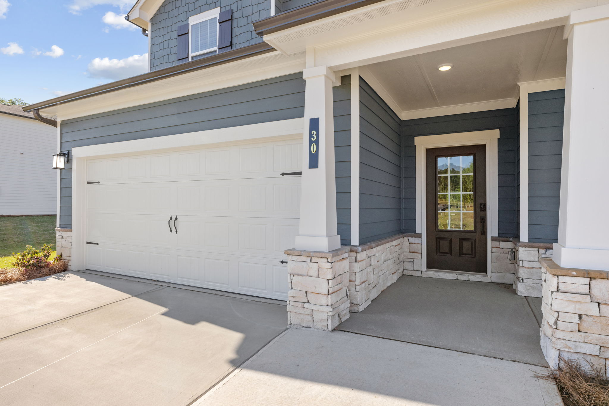 A garage with a white door.