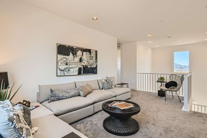A living room with a couch and a coffee table.