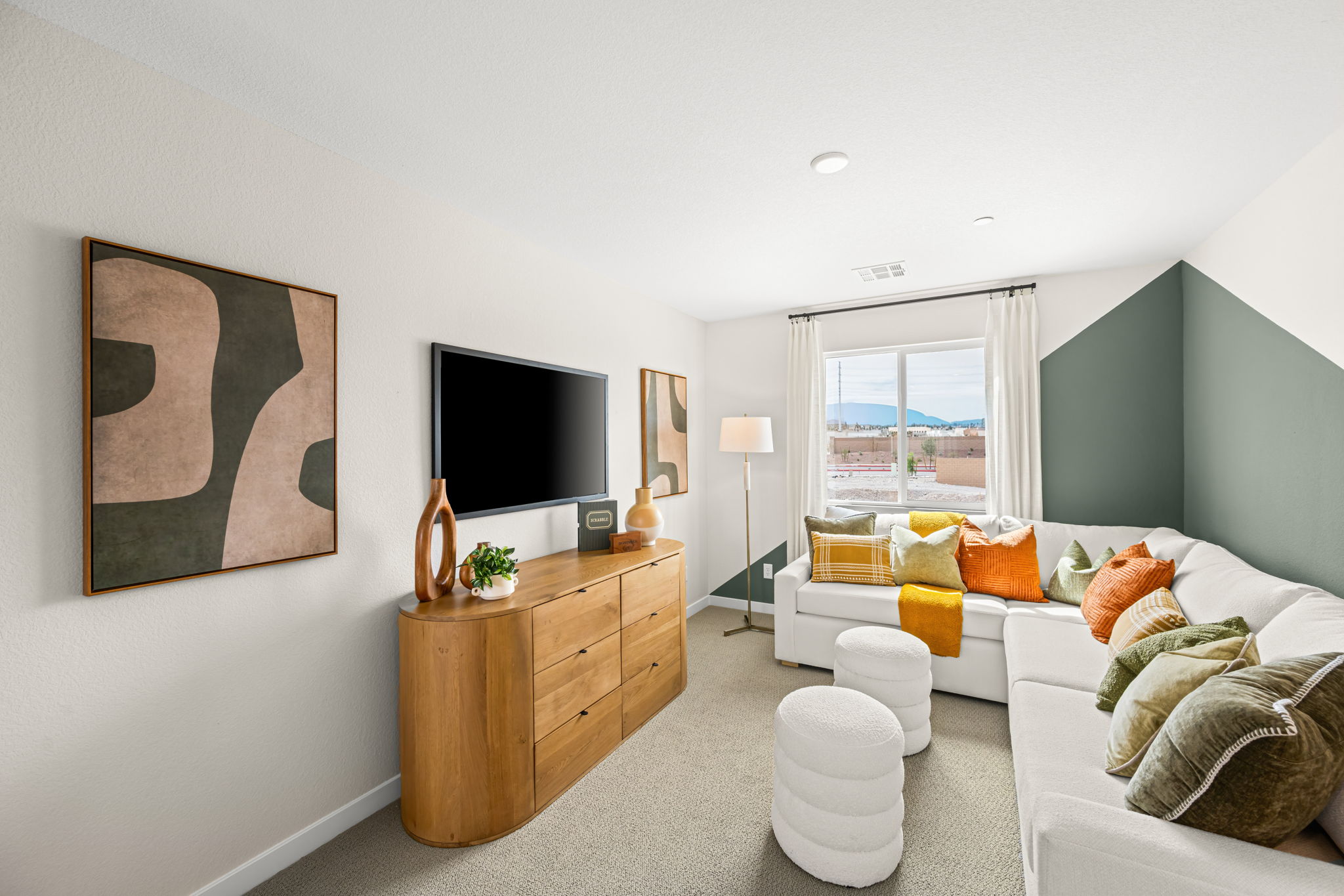 A living room with a tv and couches.