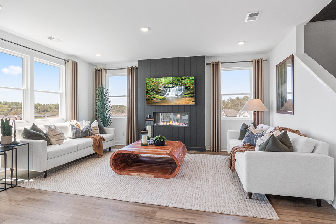 A living room with a large window.