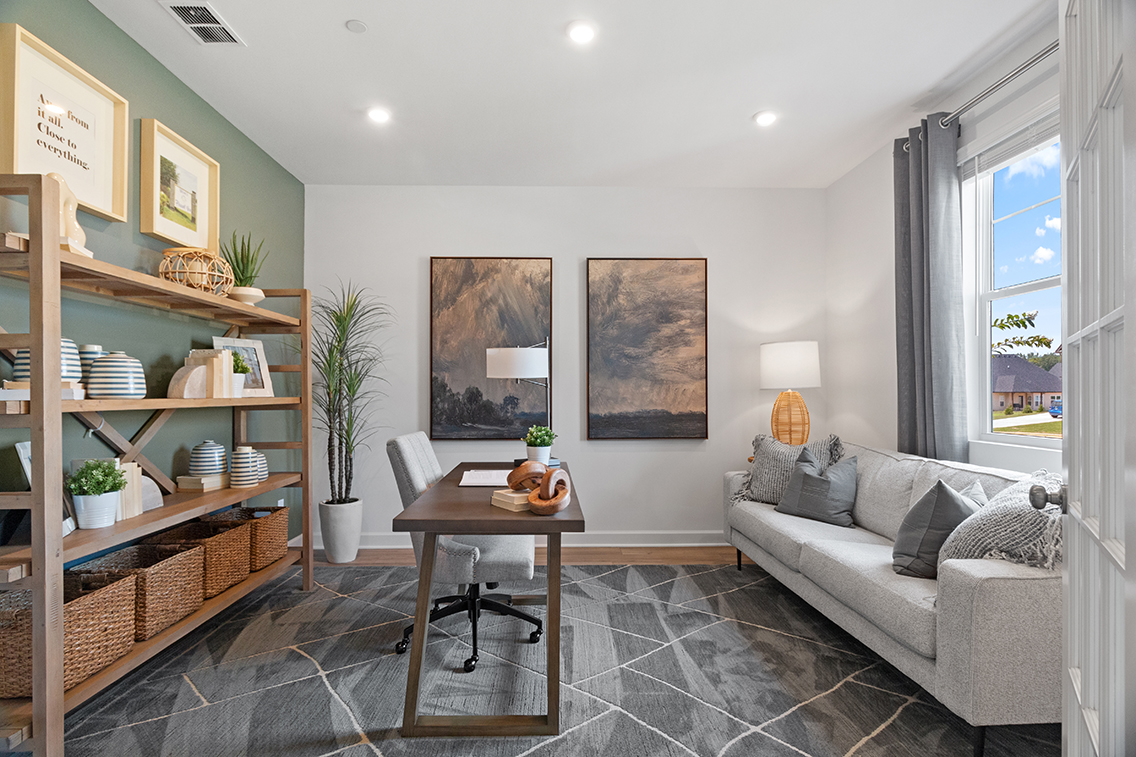 A living room with a couch and a coffee table.