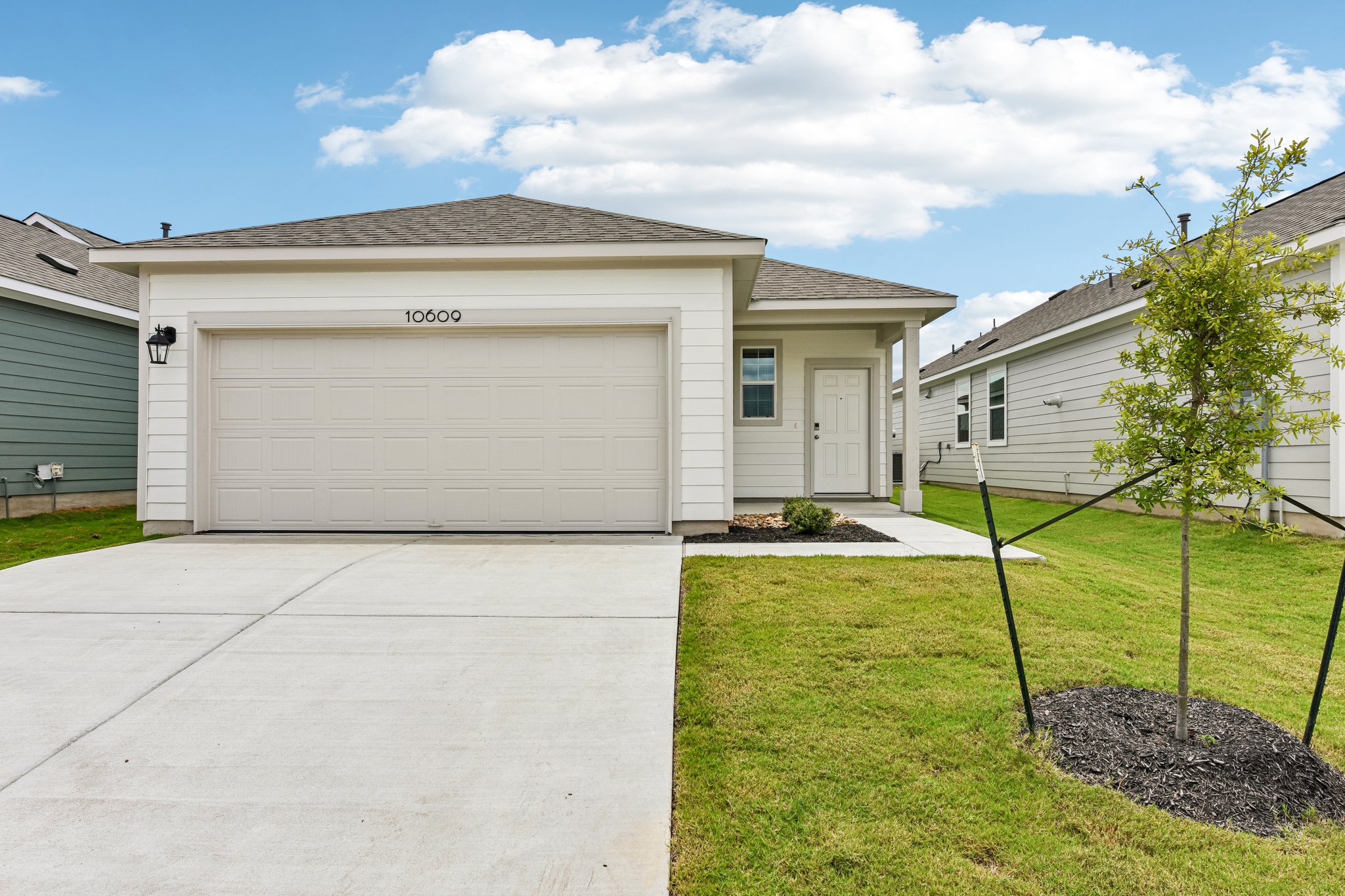 A garage with a driveway.