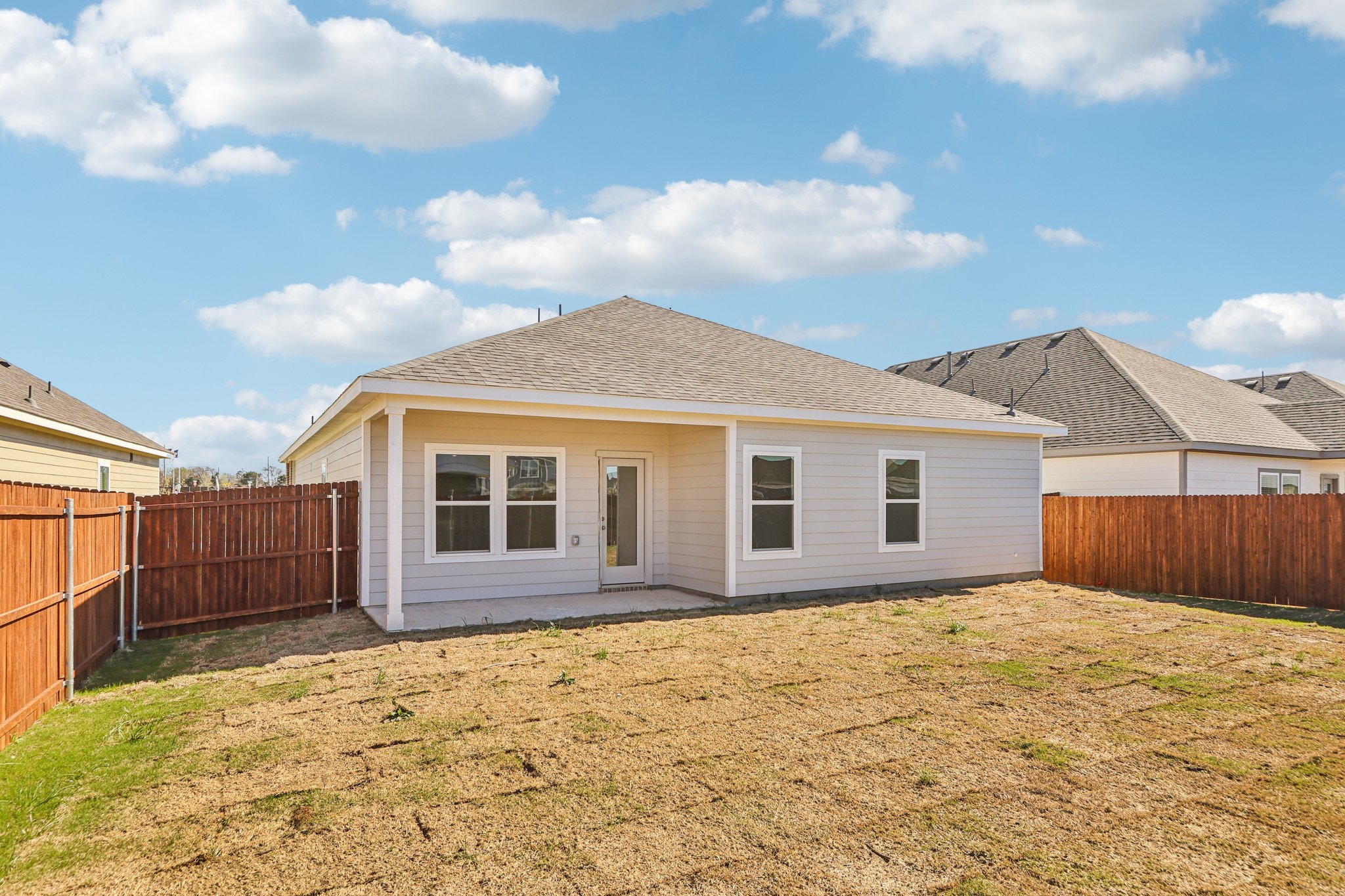 A house with a fence around it.