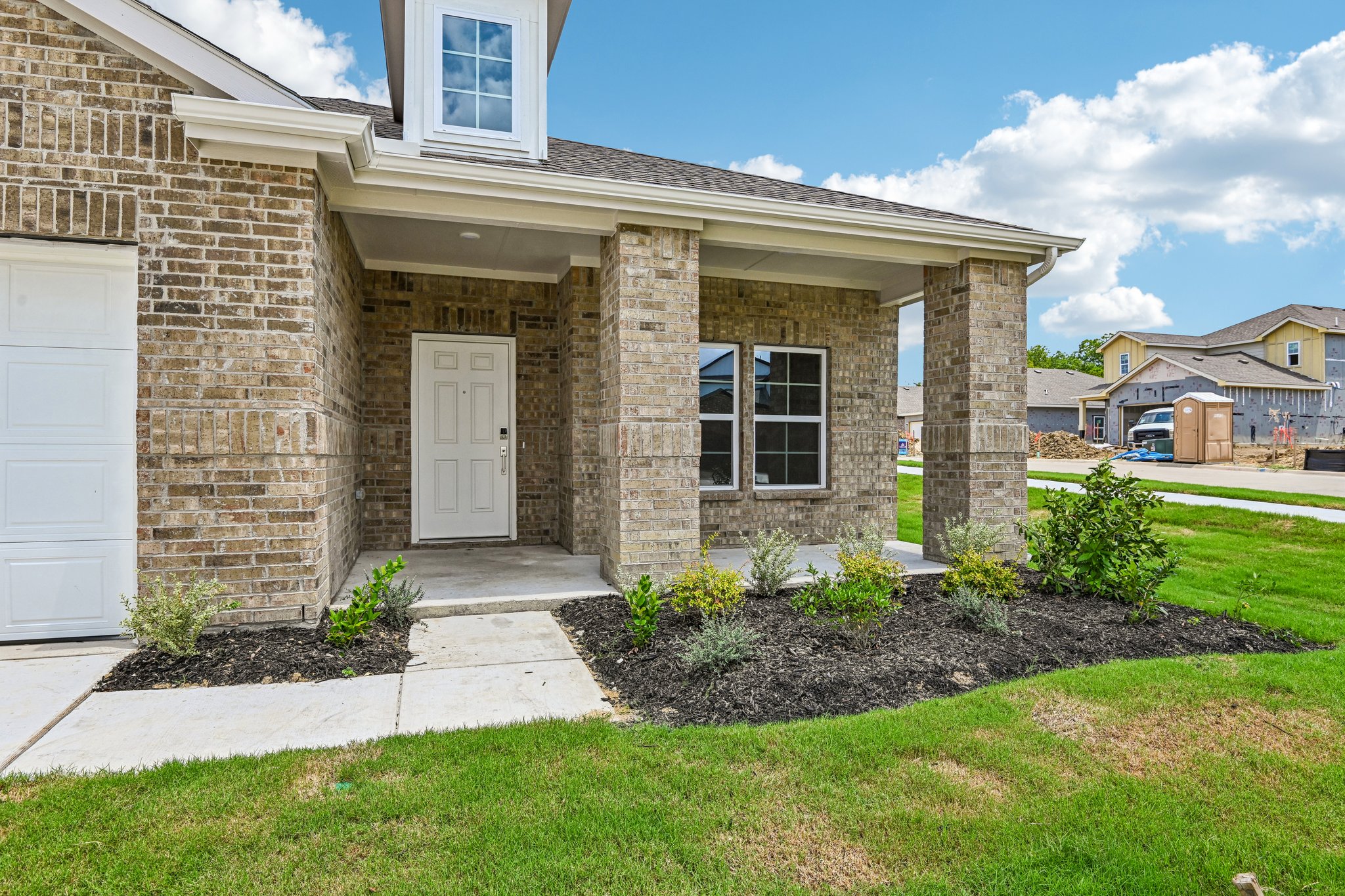 A house with a front yard.