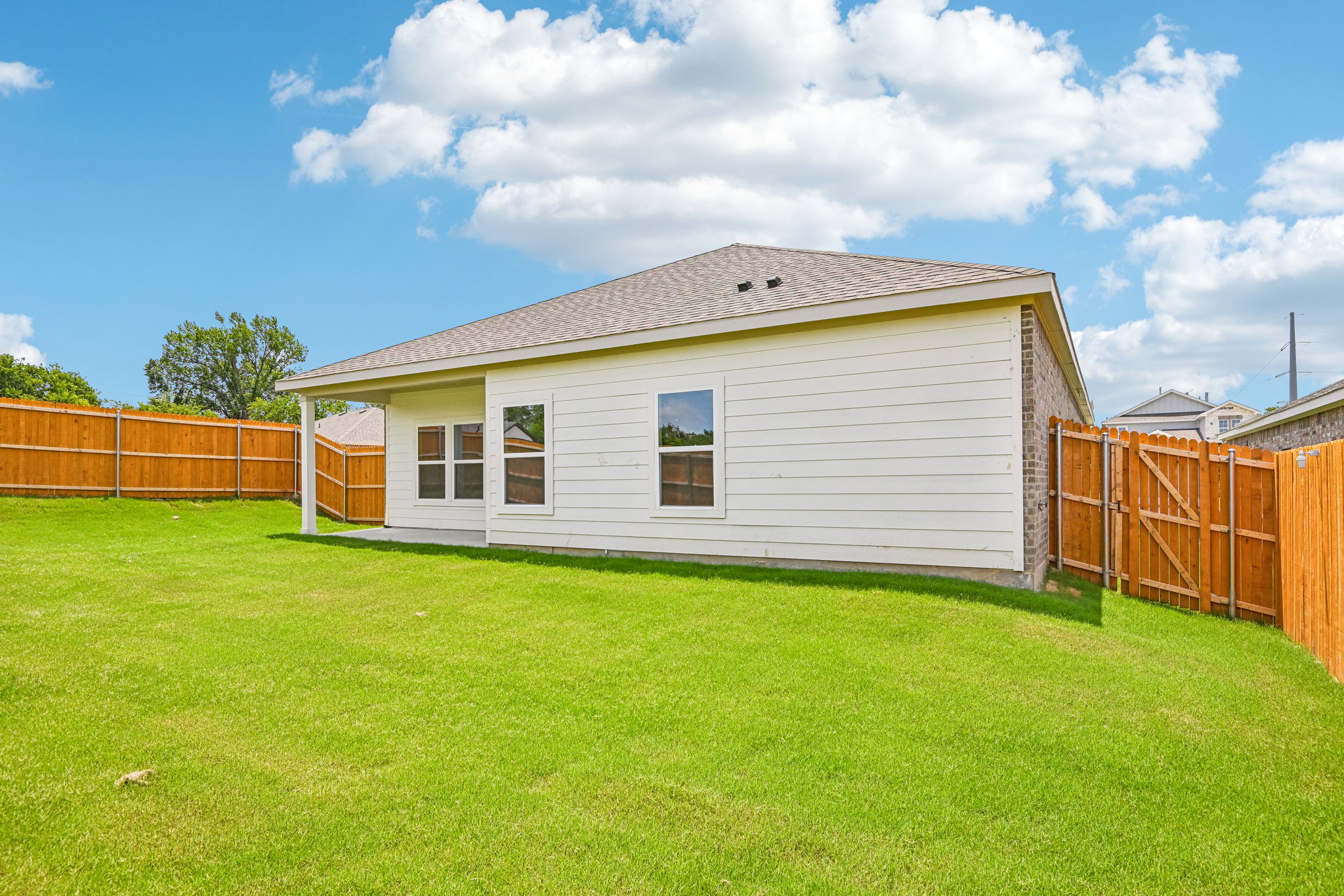 A house with a fence around it.