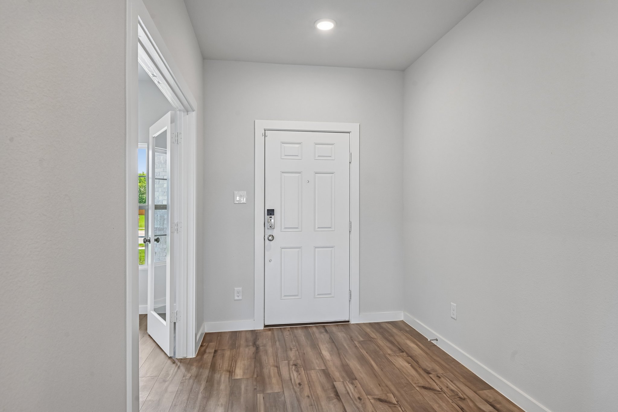 A room with white doors.