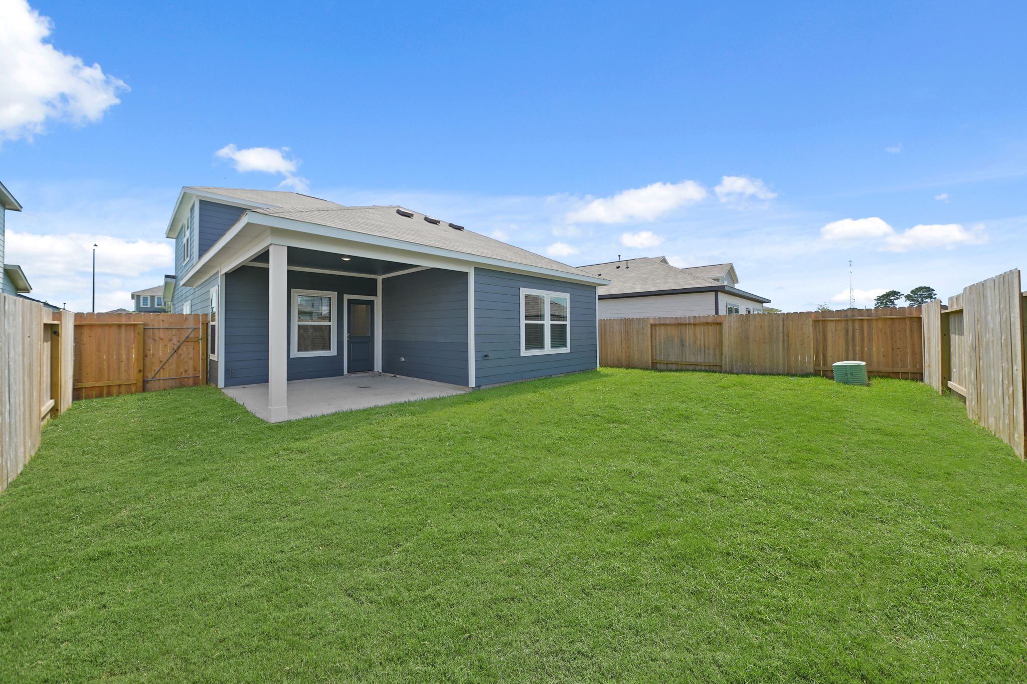A house with a fence around it.