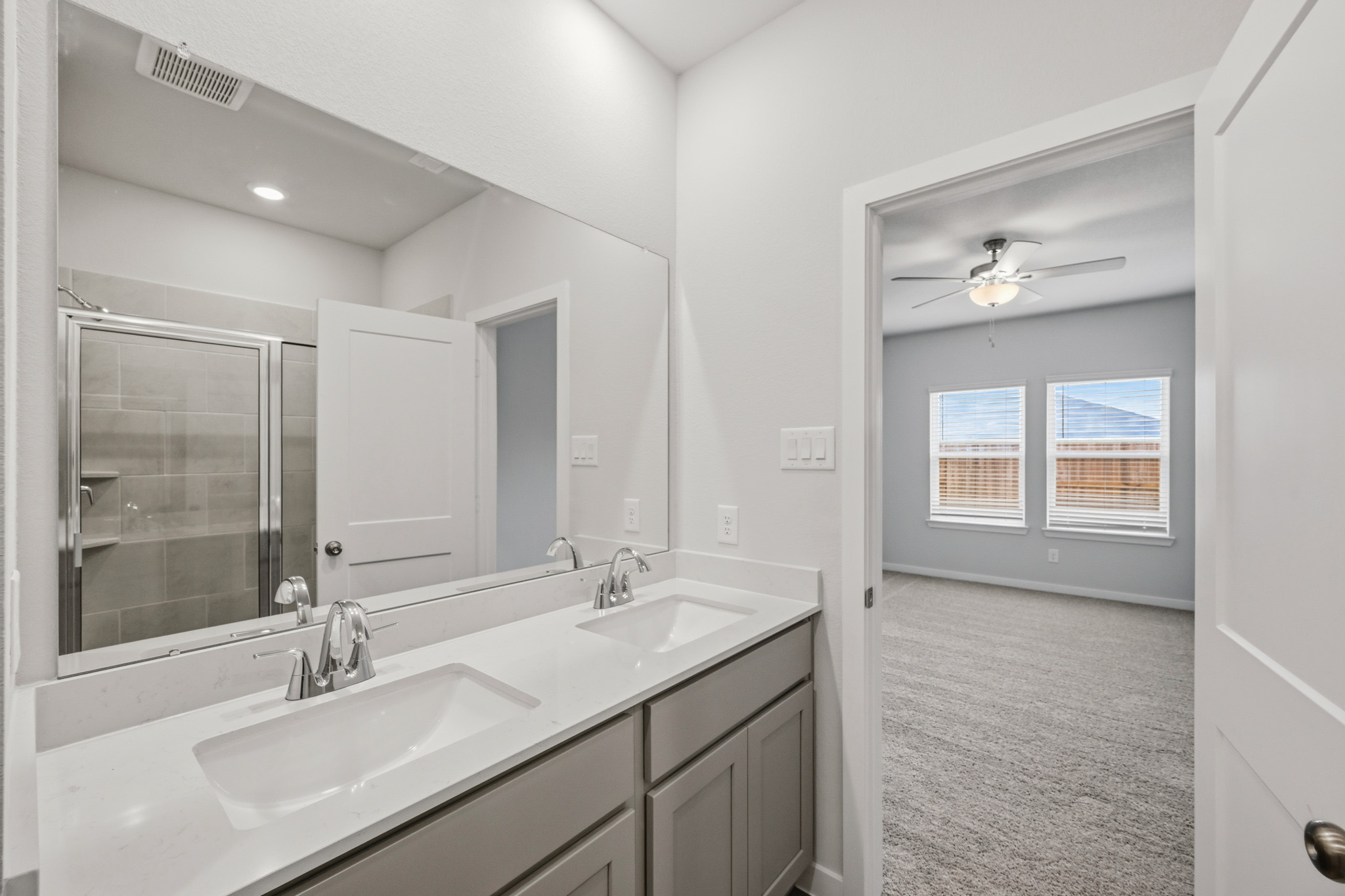 A bathroom with two sinks.