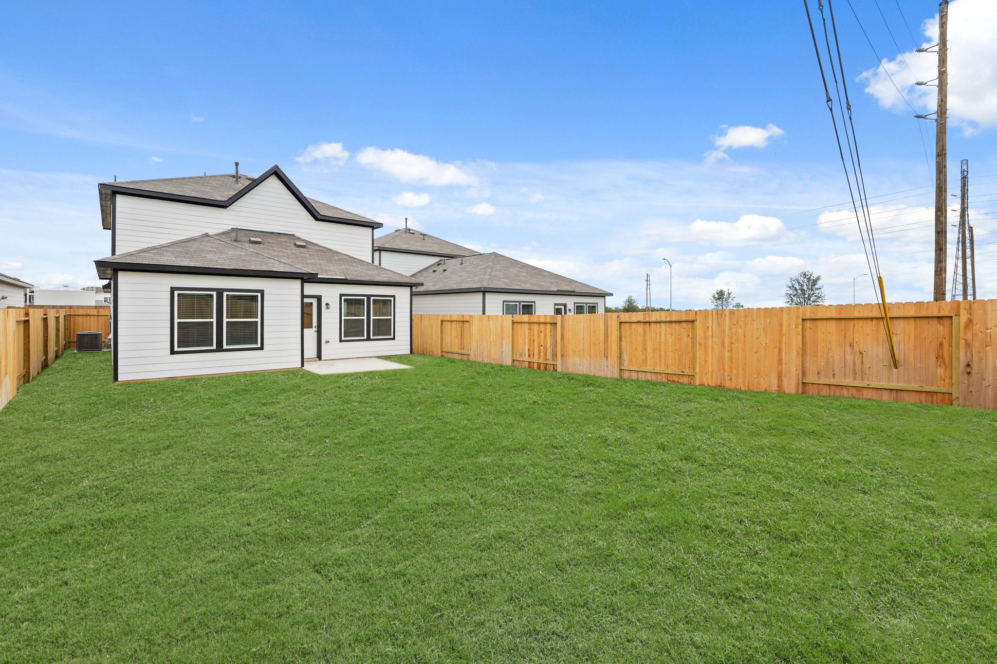 A house with a fence around it.