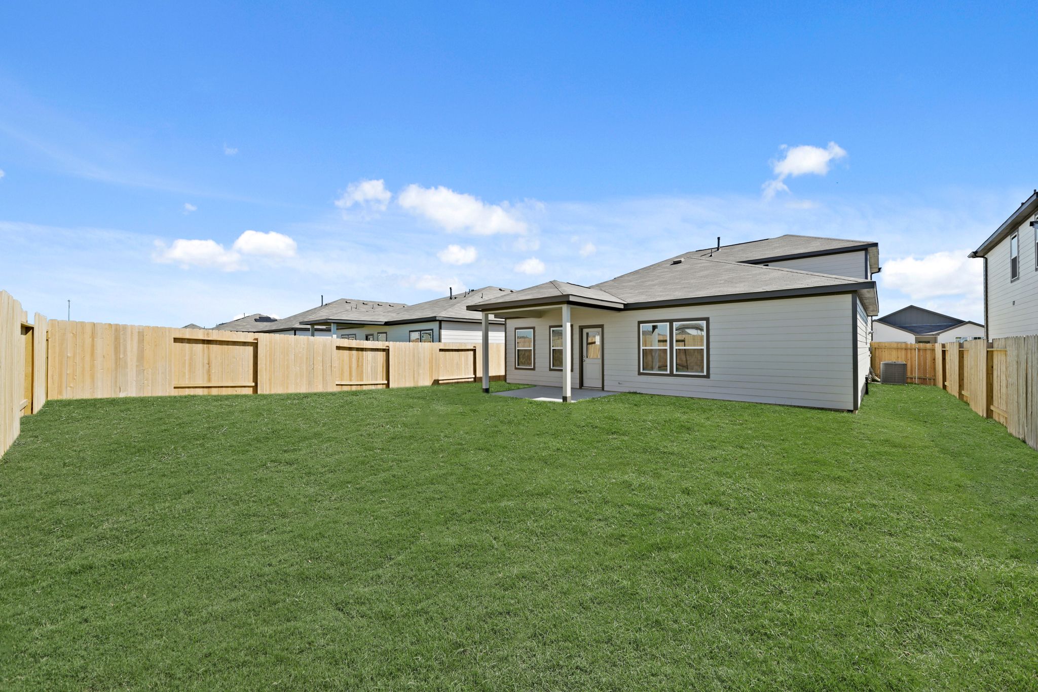 A house with a fence around it.