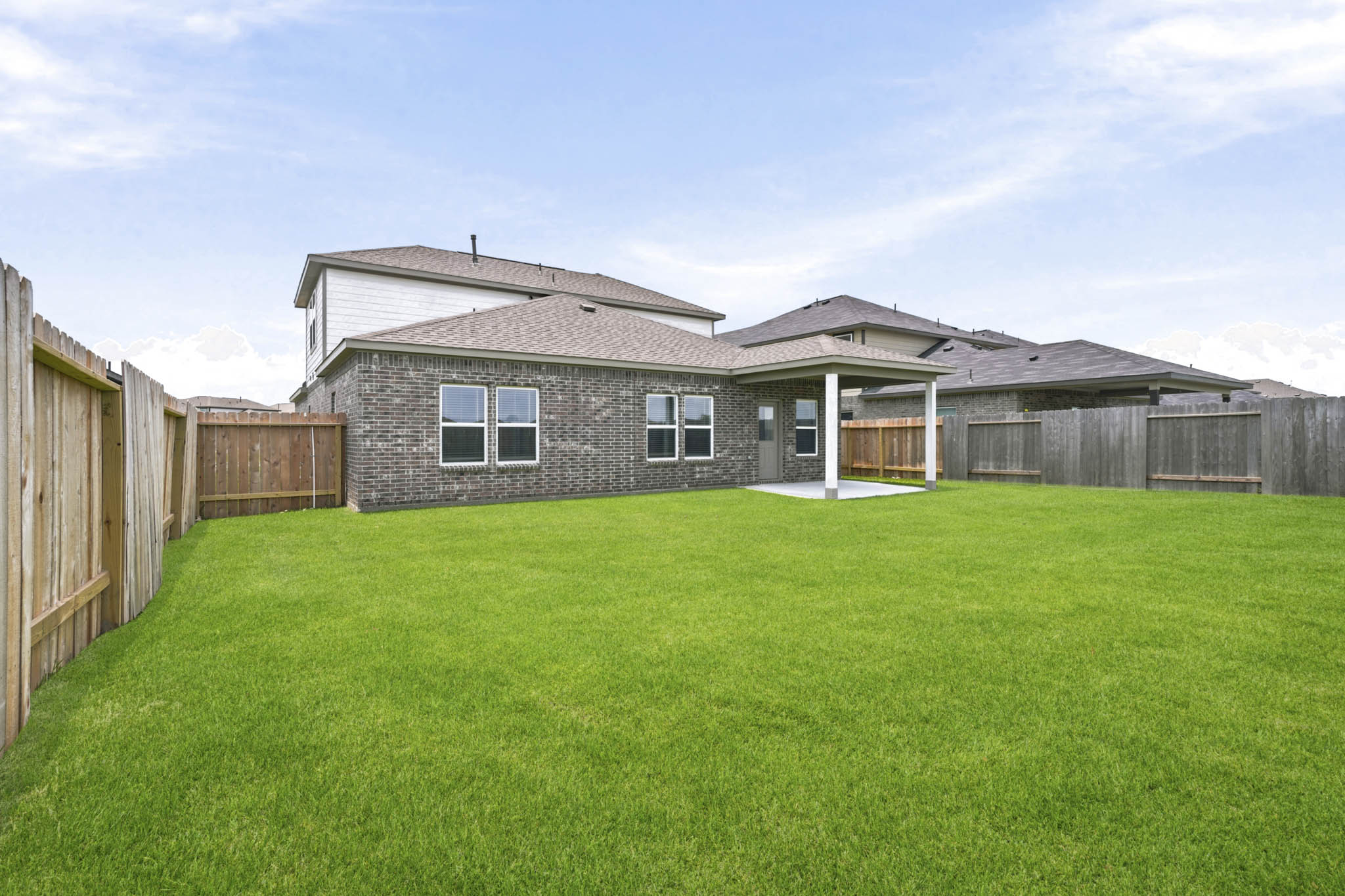 A house with a fence around it.