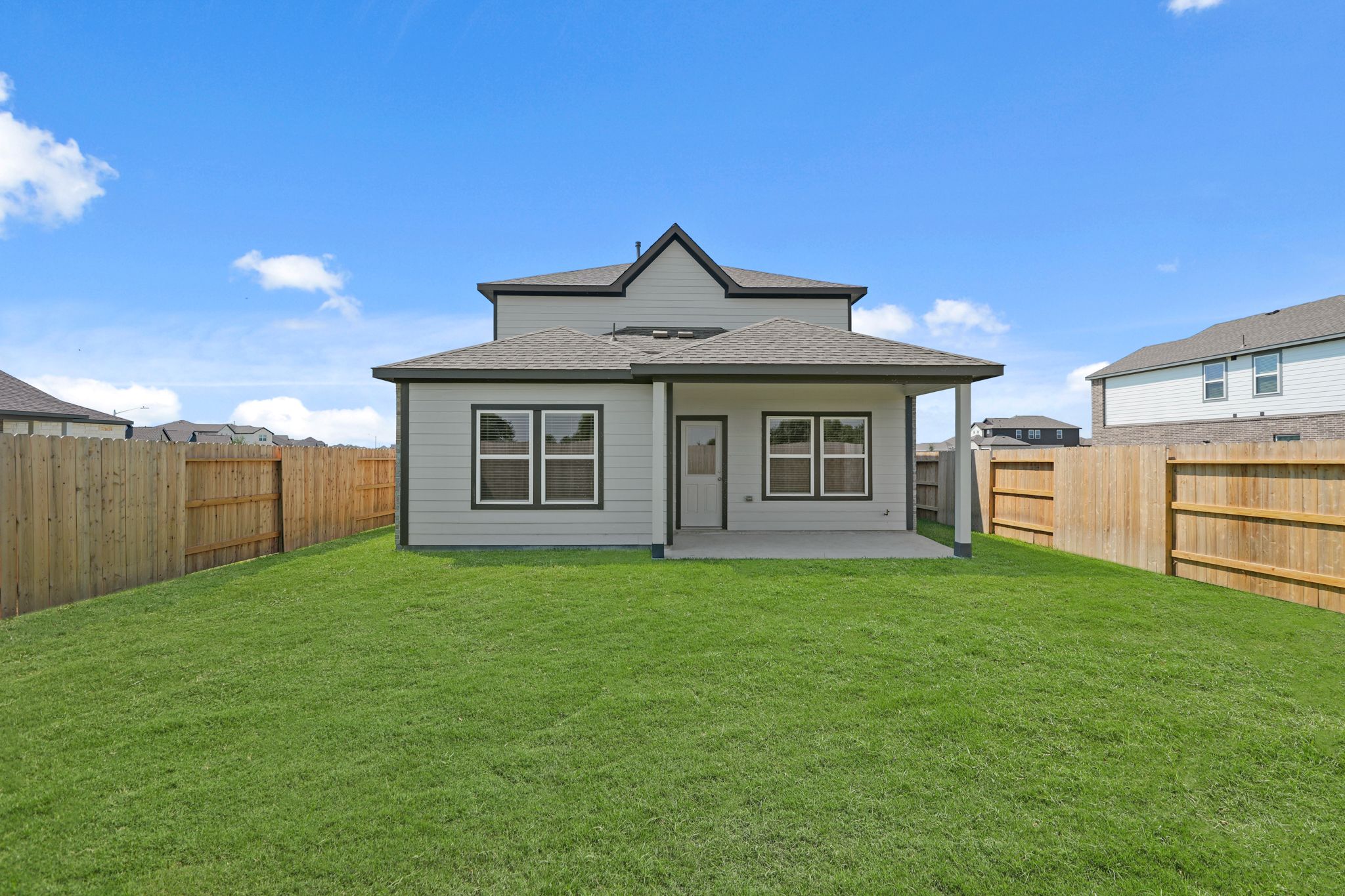 A house with a fence around it.