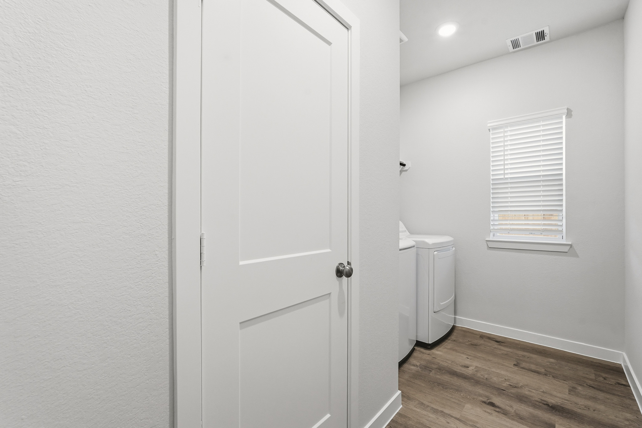 A white door in a room.