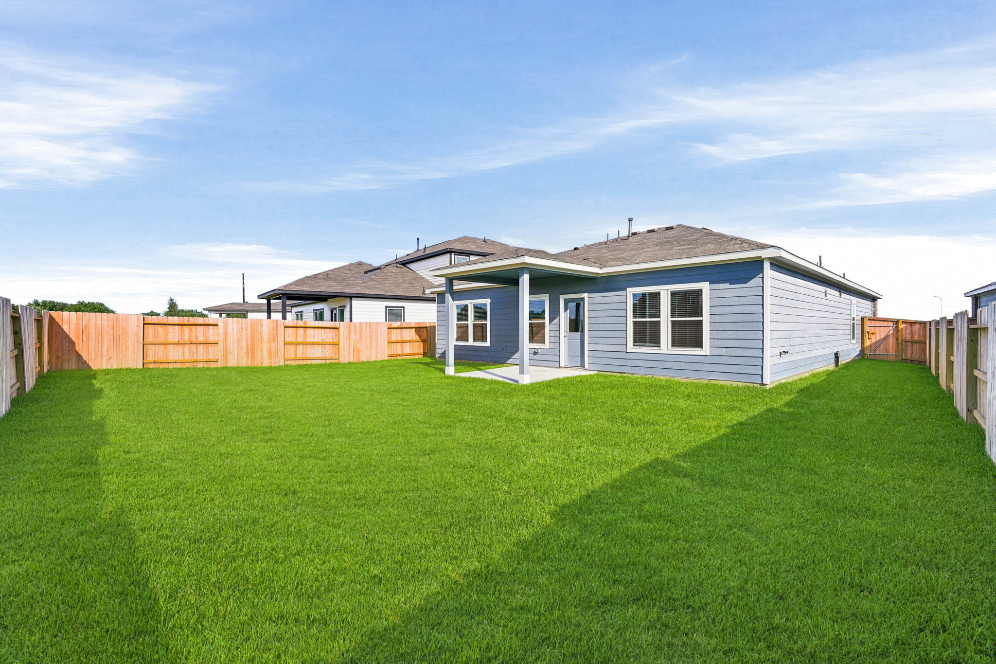 A house with a fence around it.