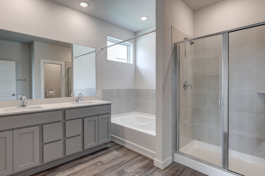 A bathroom with a glass shower.