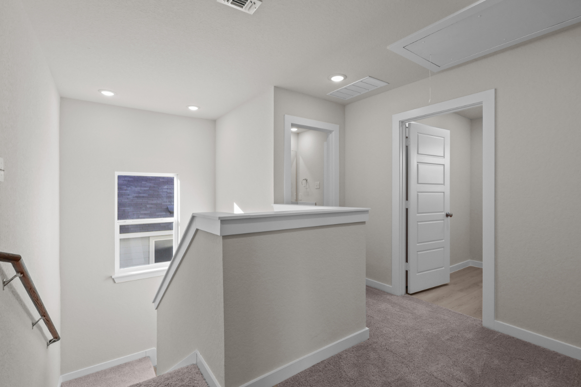 A bathroom with a sink and cabinets.