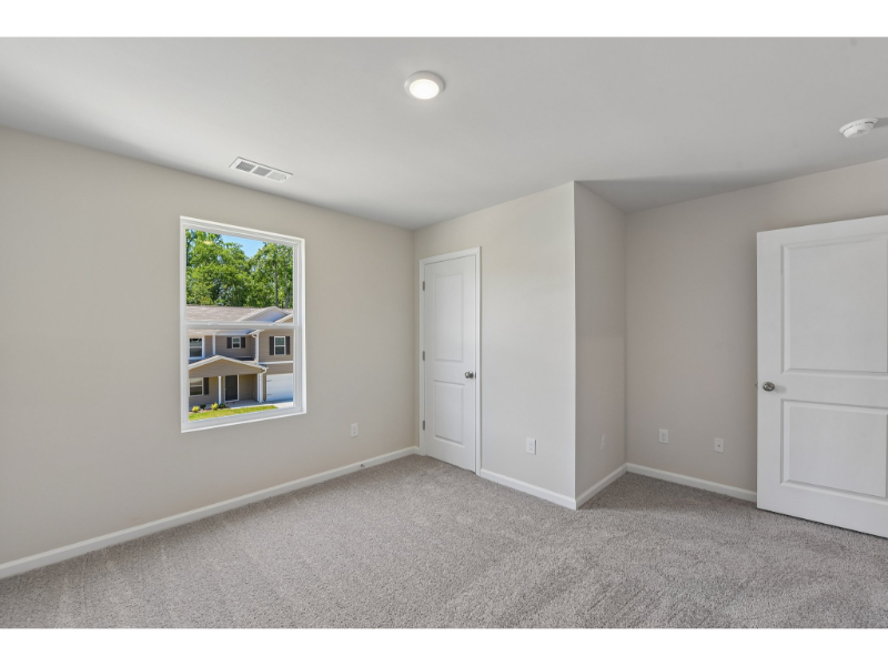A room with white doors.
