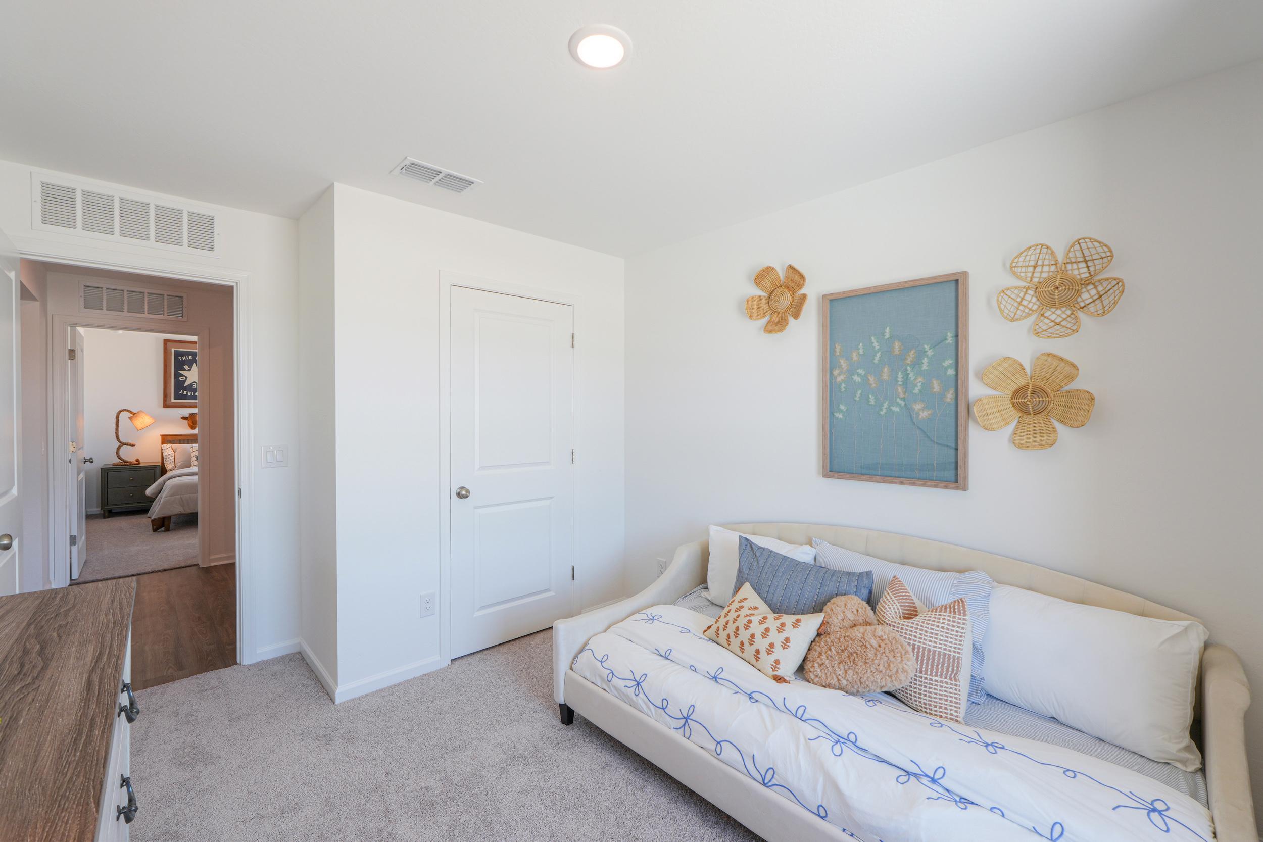 A room with a couch and a table.