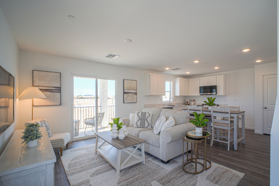 A living room with a large window.