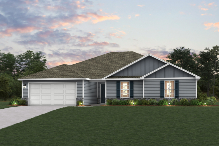 A house with a lawn in front of it.