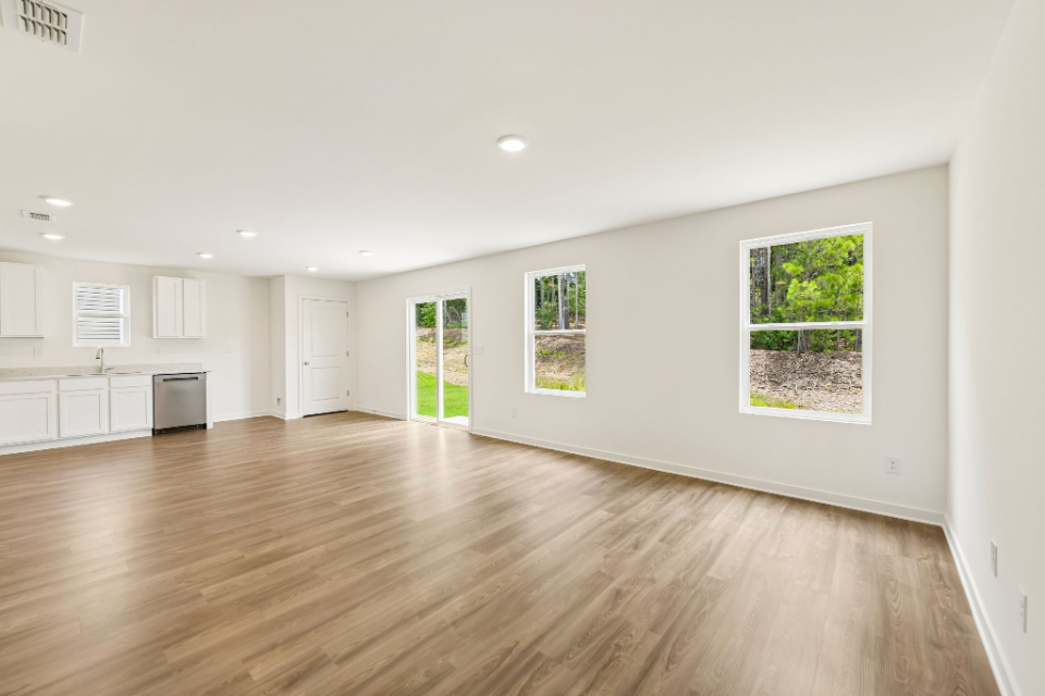 A large empty room with white walls.