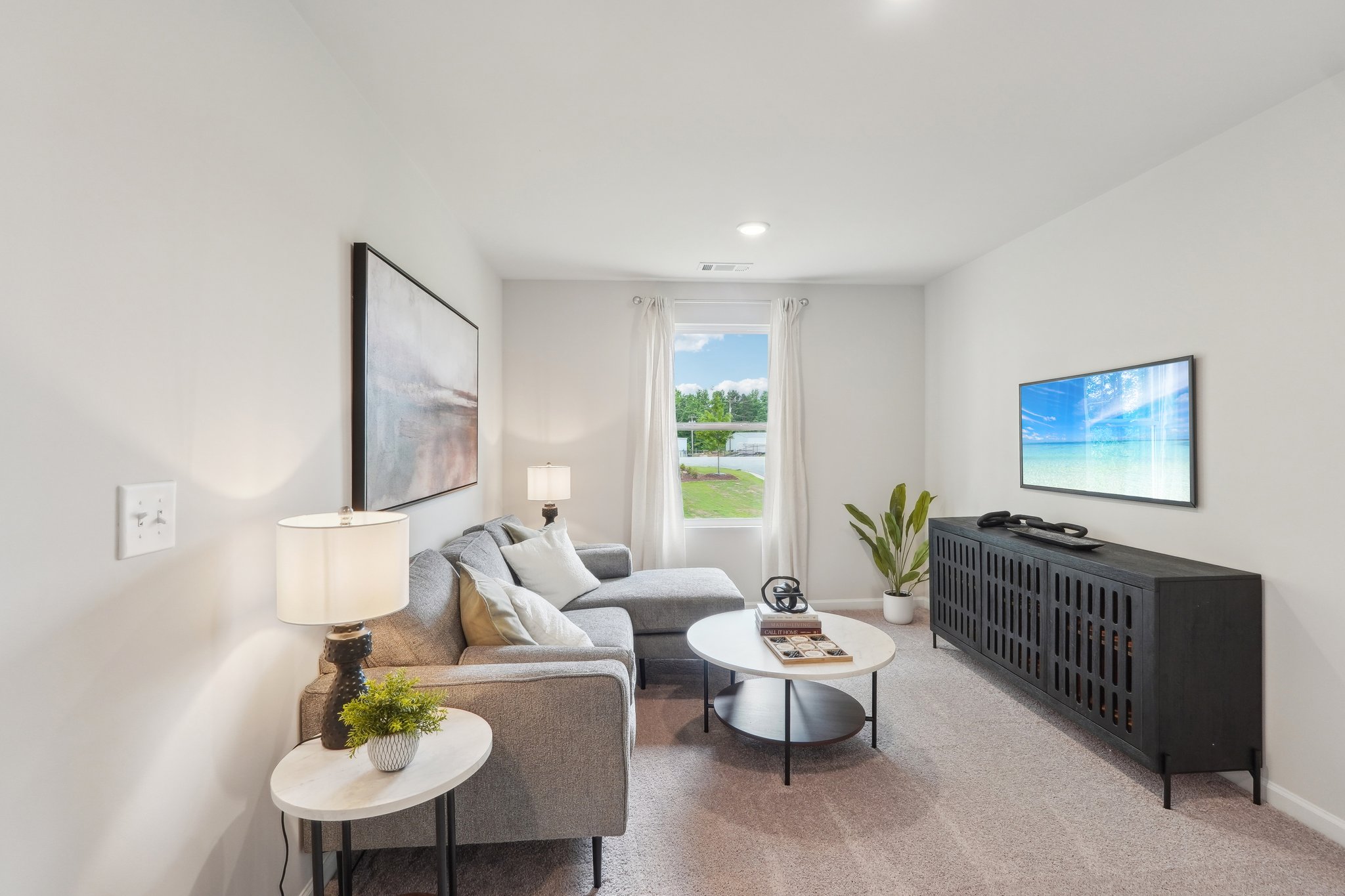 A living room with a fireplace.