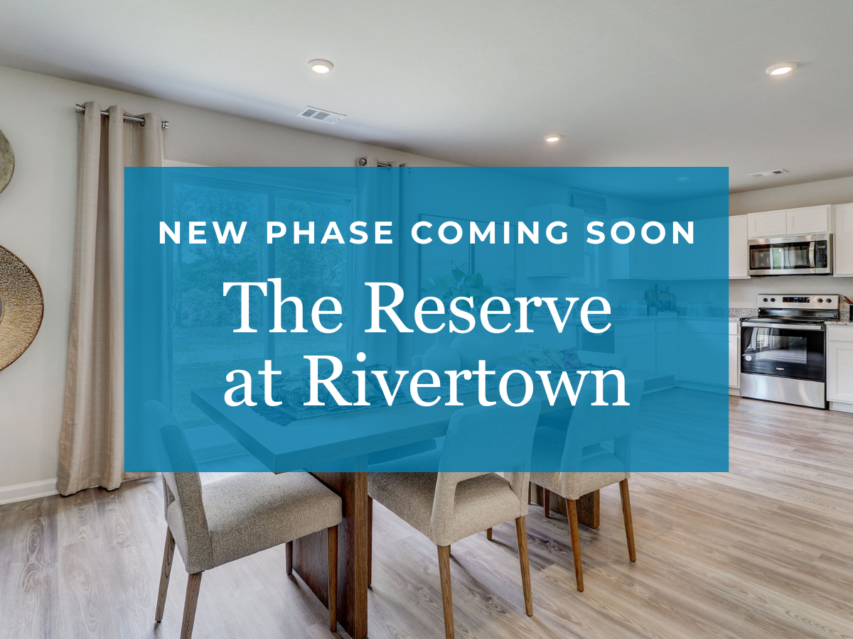 A room with a blue wall and chairs.