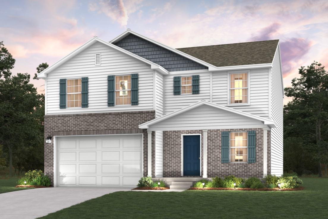 A white house with a garage.