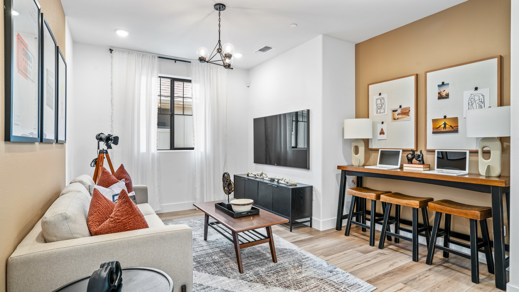 A living room with a piano and a couch.